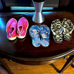 Lot of pink speedo sz 12, Frozen havaianas size 13,  Roxy flip-flops size 1